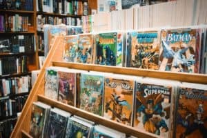 Comic books on a shelf.