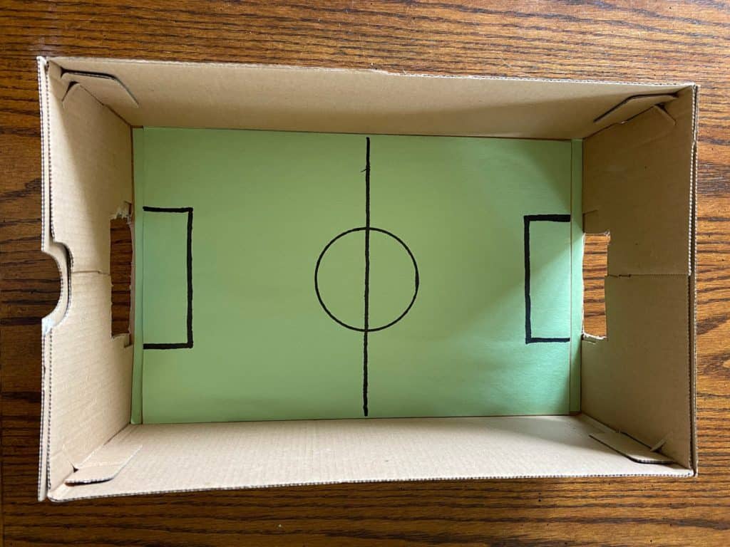 A foosball table in a box.