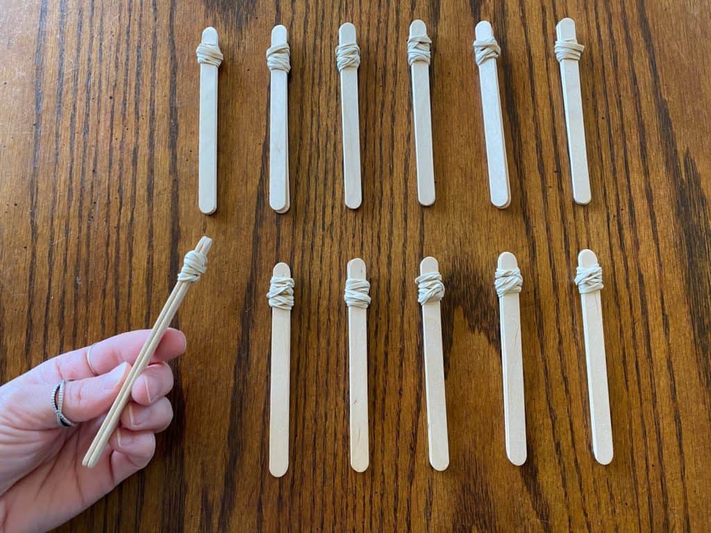 Popsicle sticks with elastics wrapped around them.