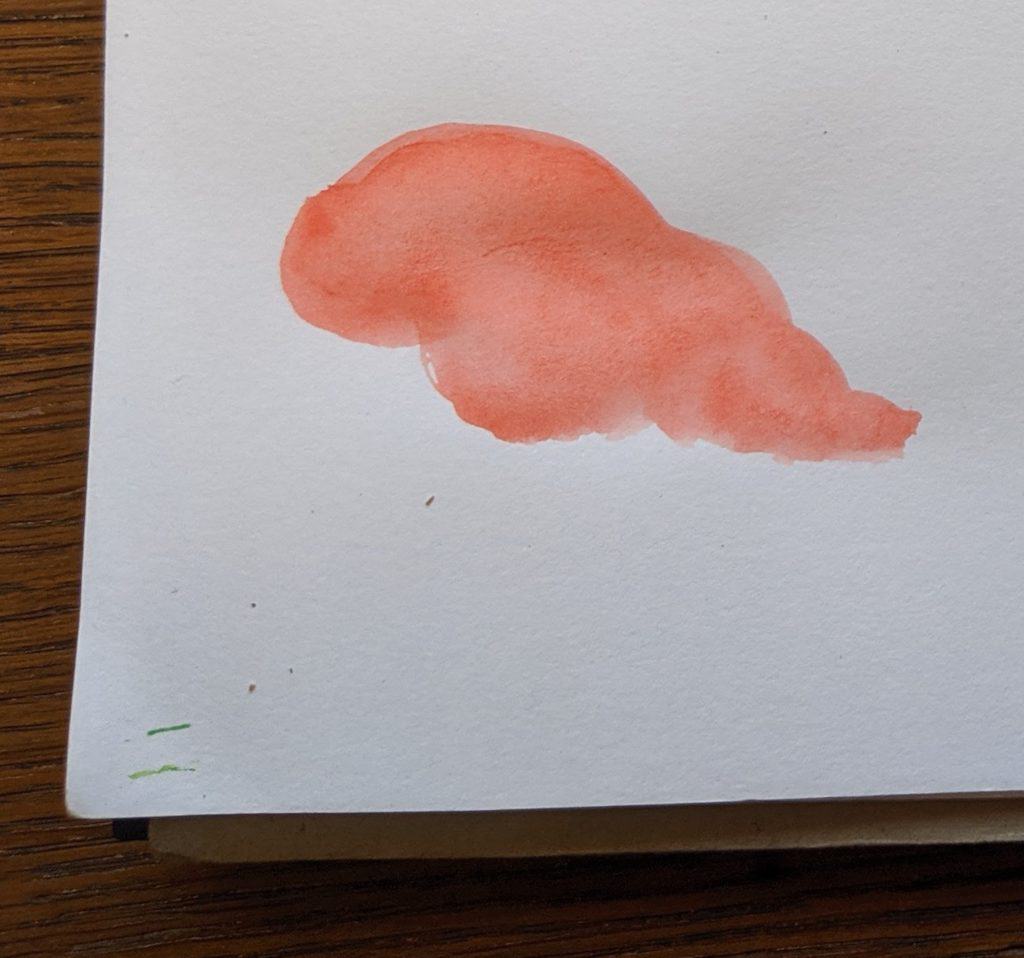 Paper with a painted blob.