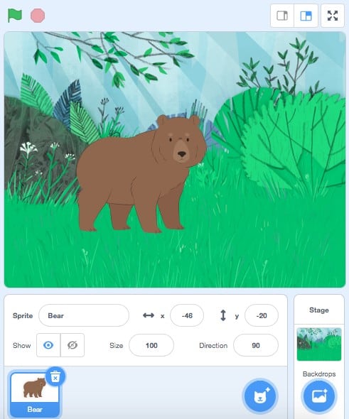 The Bear Sprite in Scratch with a Forest Backdrop.