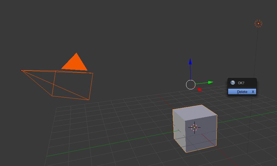 Deleting a cube in the Blender interface.