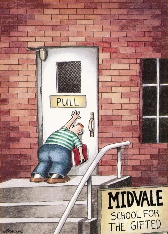 A comic illustration of a person trying to push open a door that has a pull sign.
