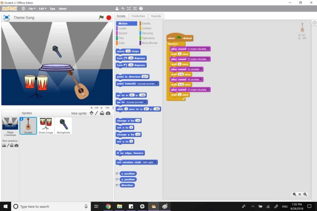Completed Scratch project with various instrument sprites along with blocks of scripts that play instrument sounds.