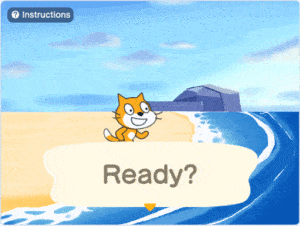 The scratch cat sitting on a beach with a speech bubble that displays "ready?"
