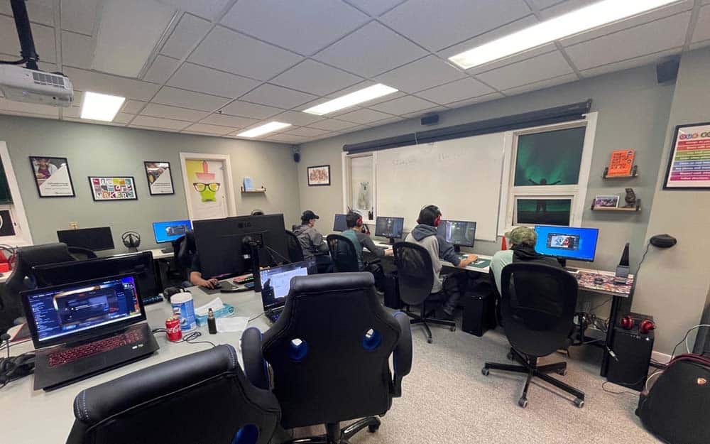 Students sitting in a computer room.